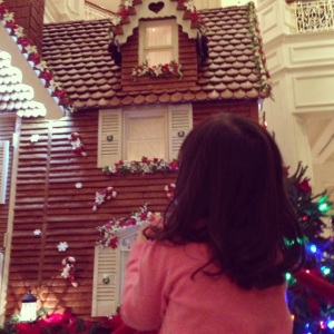 Mette in awe of the Life Sized Gingerbread House!!! in the lobby of the Grand Floridian.