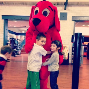 getting a picture with the star of storytime, Clifford.