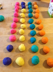 Rows of homemade playdough to give as party favors to Otto's friends.